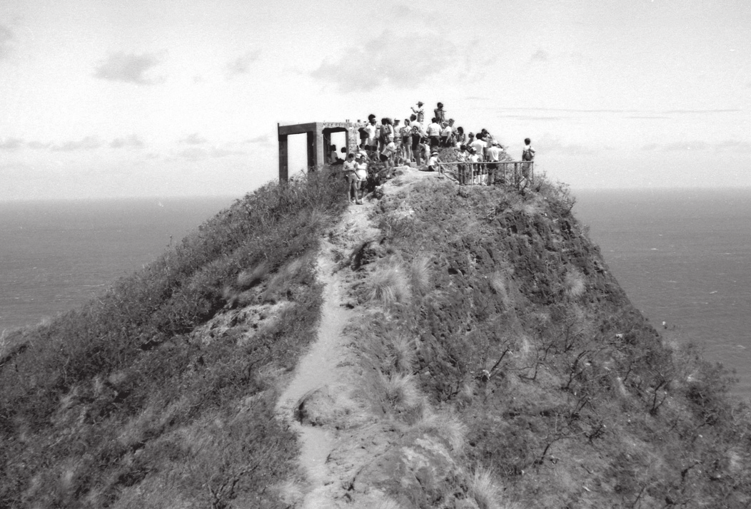 Army volunteers prepare to rappel down to remove litter